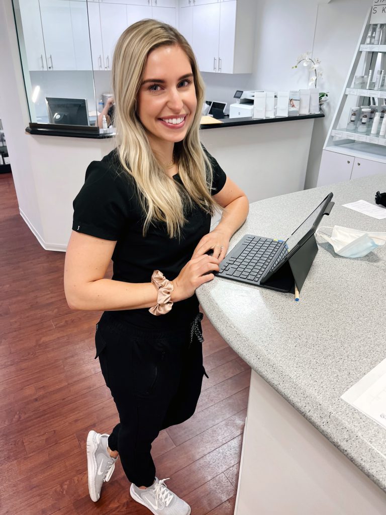 elizabeth russeau working on a tablet